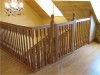 Stunning central staircase with child gate by Haughey Joinery, Co. Donegal